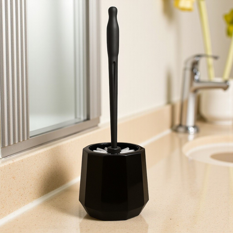 escova sanitária moderna na cor preta sobre a pia para demonstração