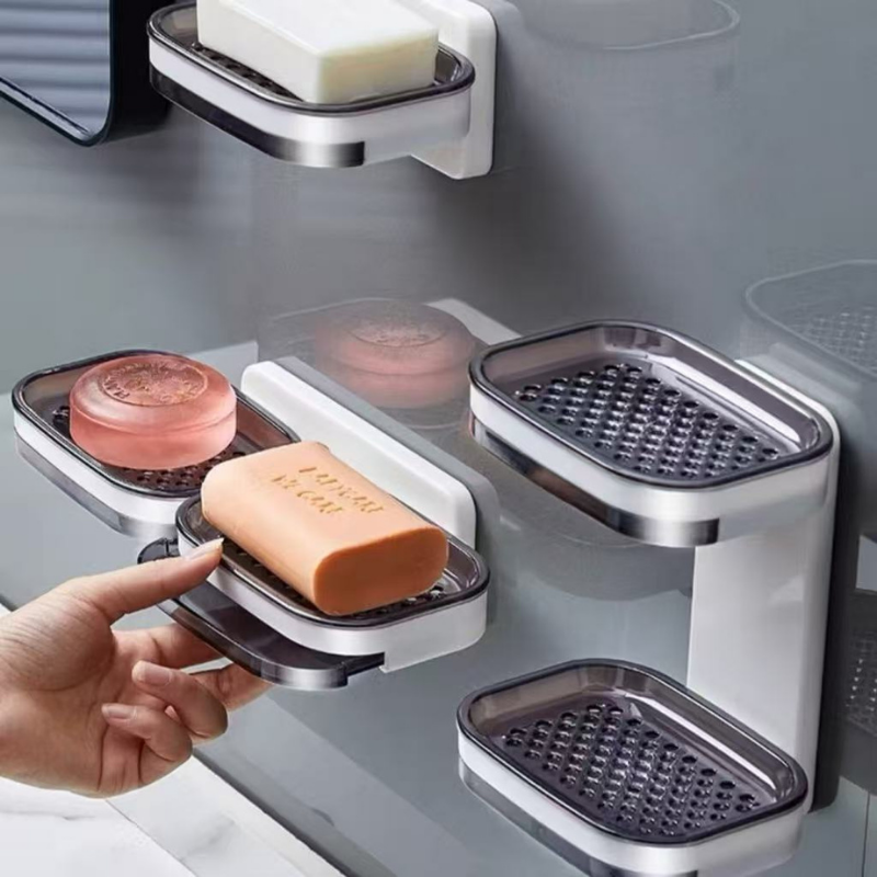 saboneteira com dreno com sabonete em cima para tomar banho